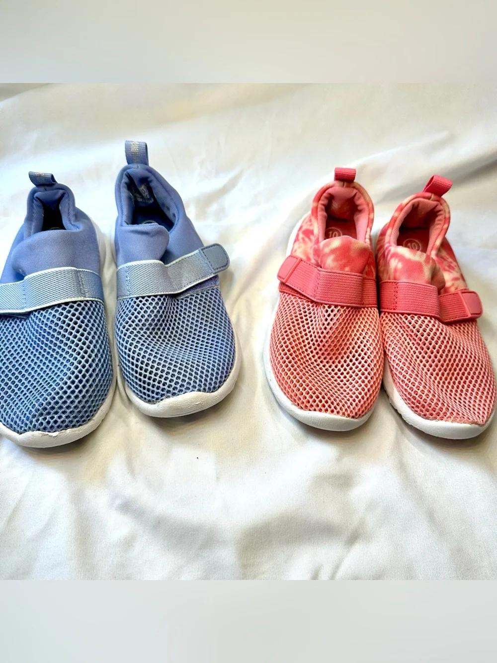 Two pairs of Kids Slip-On Mesh water shoes in Blue and Coral
